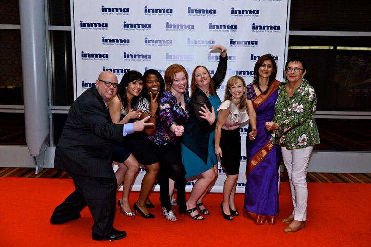 Earl J. Wikinson with staff after a Global Media Awards dinner at World Congress.