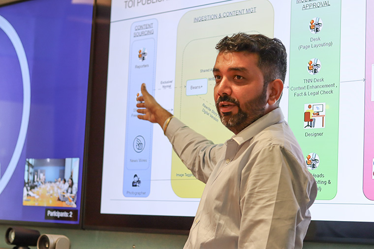 Tarun Sood, assistant vice-president/technology at The Times of India speaks to attendees during the study tour on Tuesday.