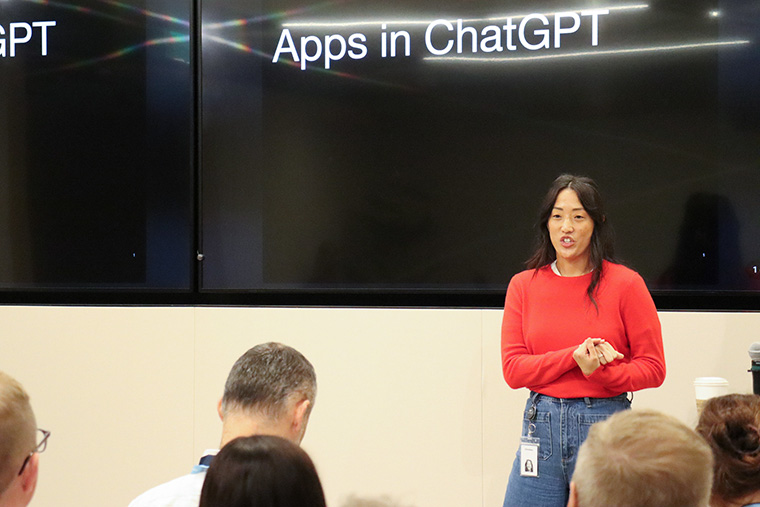 Christina Lim, partner manager/media partnerships at OpenAI, speaks to attendees of the three-day study tour through Silicon Valley and San Francisco.