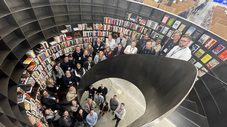 INMA study tour attendees on a 2023 Subscriptions Summit study tour of The Atlantic in New York.