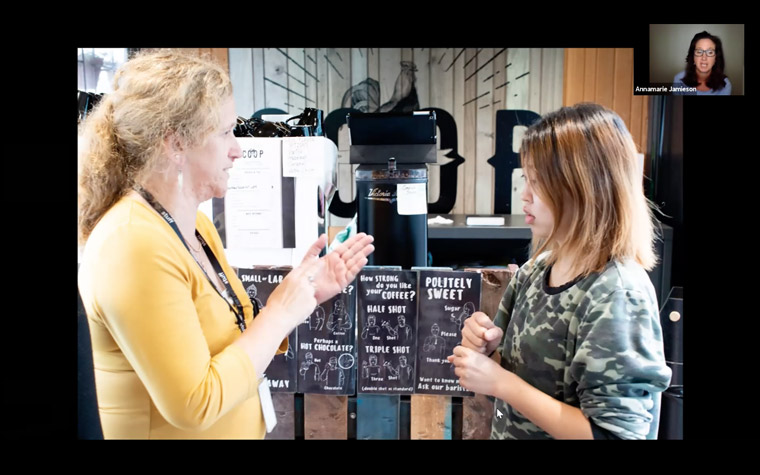 Staff at Stuff use sign language, New Zealand’s third national language, to order coffee at the onsite coffee shop run by a deaf barista.