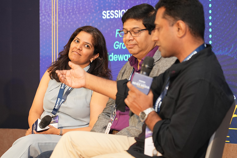 Sneha Beriwal of AND Marketing listens to a point by Aditya Kanthy of Omnicom Advertising Group at the INMA Mumbai conference. 