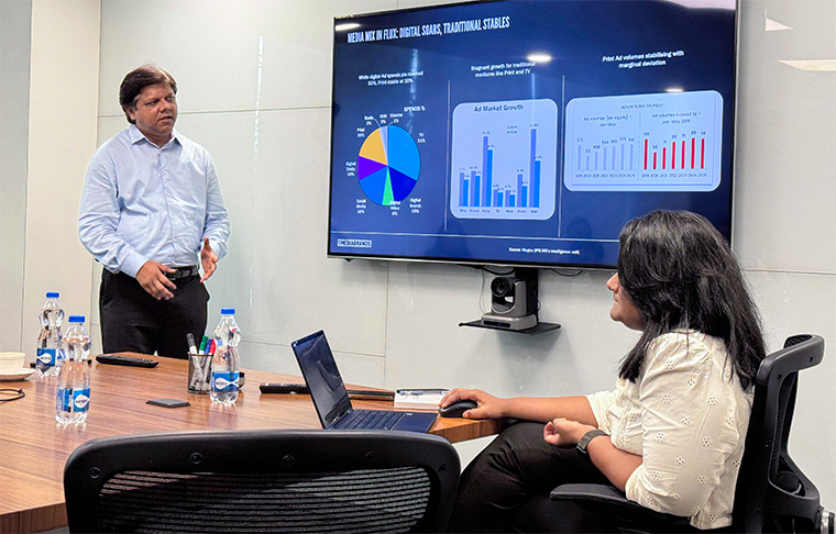 Dhirendra Singh of IPG Mediabrands shares examples of campaign execution with a INMA Mumbai study tour participant.