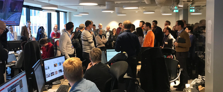 Study tour participants tour Nattavisen newsroom, an online-only daily newspaper owned by Amedia.