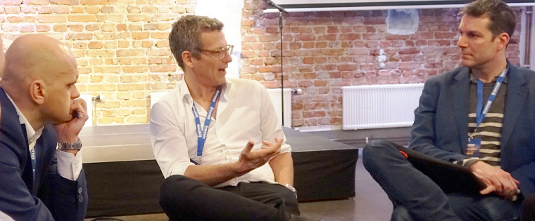 Trevor Kaufman, CEO of Piano, talks with participants in the Newcomers Workshop on Wednesday.