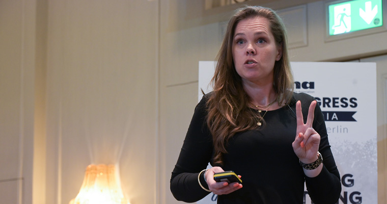 Mediahuis B2B Strategy Director Kitty Brouwer speaking during the advertising seminar.