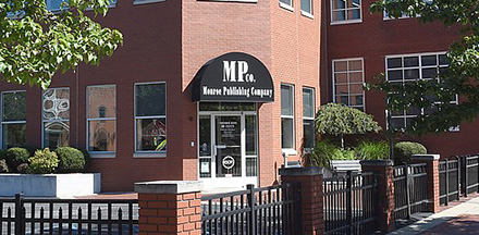 Photo from outside the front of the Monroe Publishing Company's offices