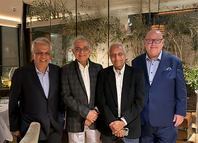 At a dinner celebrating the 20th anniversary of INMA in South Asia at New Delhi's Indian Accent, former South Asia Division presidents Rajiv Verma, Ravi Dhariwal, and D.D. Purkayastha share a moment with INMA CEO Earl Wilkinson.