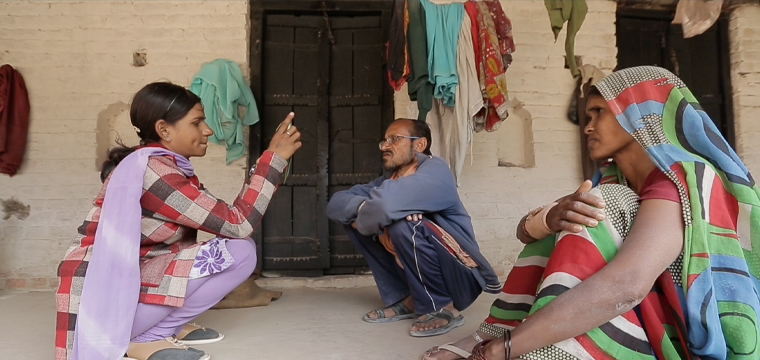 A journalist for Khabar Lahariya reports via smartphone in Mahoba, Bundelkhand, India.