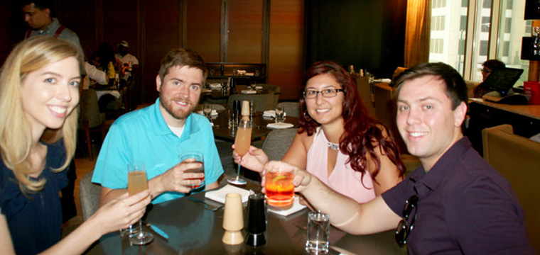 Two couples (from left to right: Jennifer Strom, Collin Coltman, Nicollette Canovas, and Casey Purta) explored Chicago for a day while using Groupon Coupons along the way to save money. They chronicled the experience as part of a Groupon native advertising campaign.