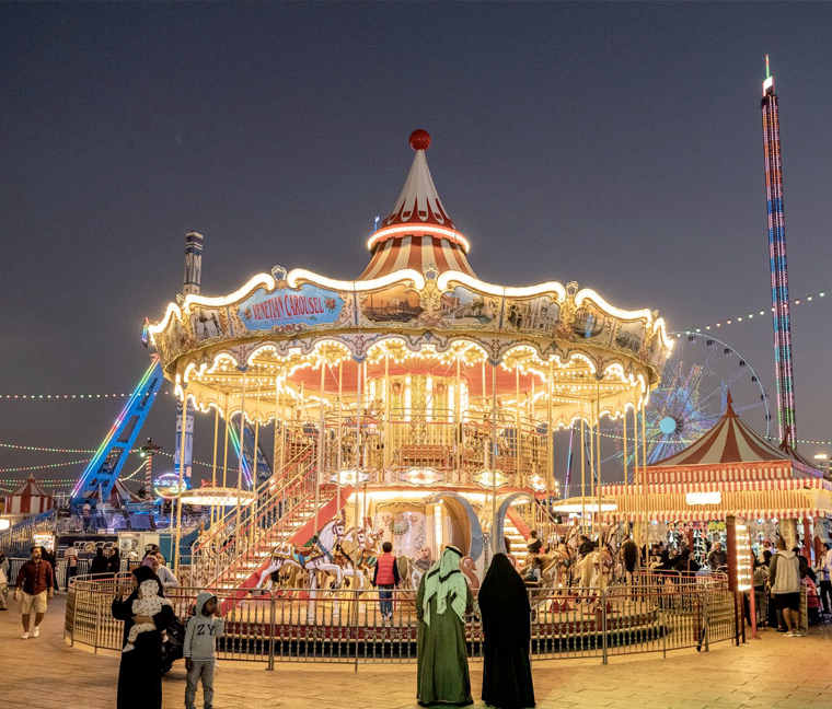 Global Village in Dubai is a multicultural festival park that’s part shopping, part dining and part theme park. At night, the fairground lights up. (Katarina Premfors for The Washington Post)