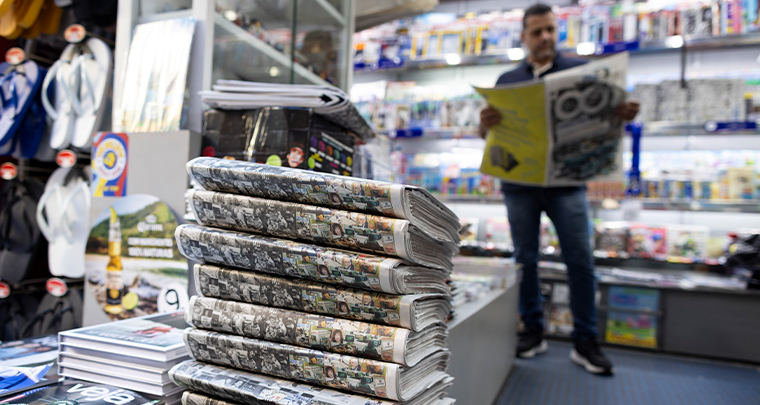 The centennial edition ran 526 pages and weighed nearly two kilograms.