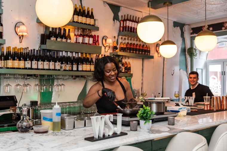 A Chef's Dinner featured the female-owned restaurant Cadence and included a behind-the-scenes tour with the chef.