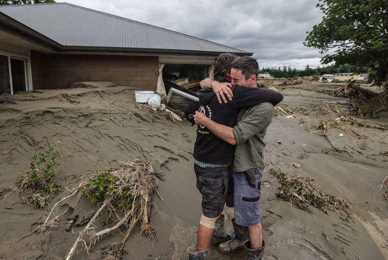 Two brothers reunite in the wake of Cyclone Gabrielle. Photo by Chris Skelton/Stuff