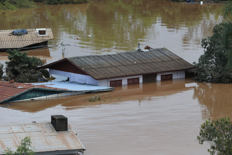 Survivors climbed to the highest points inside their homes as the floodwaters rose.