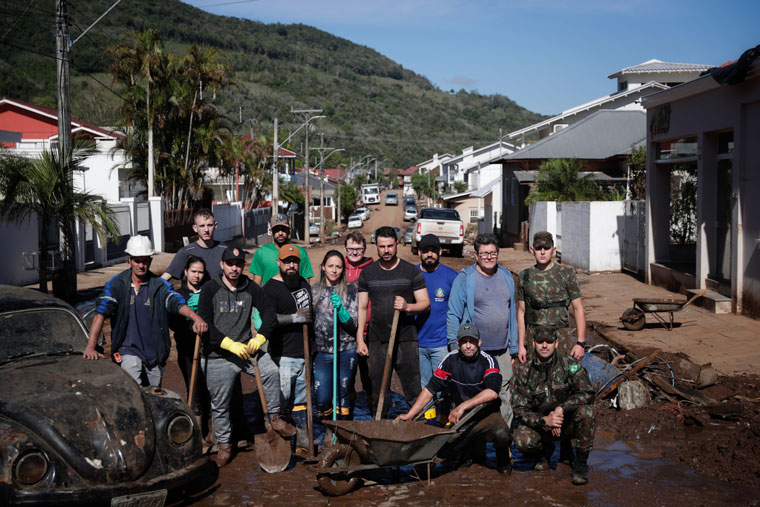 The community came together to help people rebuild what had been lost in the floods.