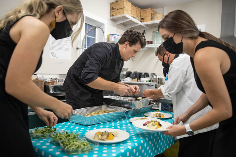 Chef Matty Neufeld and his team from Prairie Kitchen Catering plate up one of the three courses.