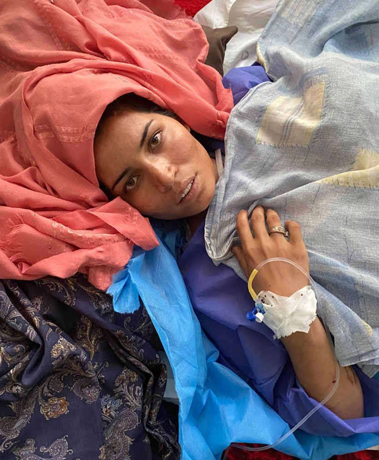Herat, Afghanistan, August 2021: Somaia was wounded in a Taliban attack when she went out to get some water. Her daughter Zainad, 4, did not survive, but Somaia didn't know it when this picture is taken. Photo by Magda Gad
