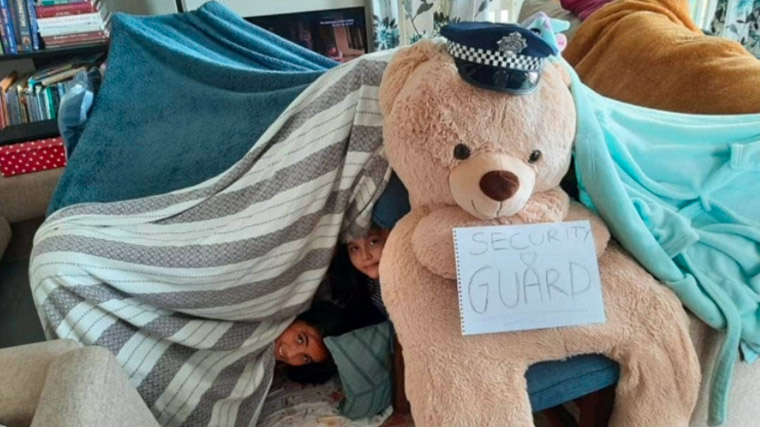 This indoor fort came with its own security guard.