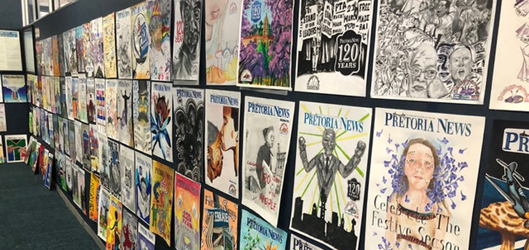 The Pretoria News #120 high school art project posters displayed for judging.
