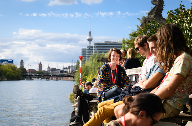 Z2X participants enjoy a break at the Spree in Berlin. Photo by Phil Dera.