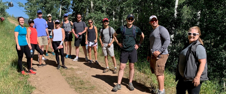 Participants at last week’s Vail Roundtable take a break from hiking to admire the view.