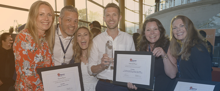Team from Amedia celebrates an award in Washington, D.C., last year.