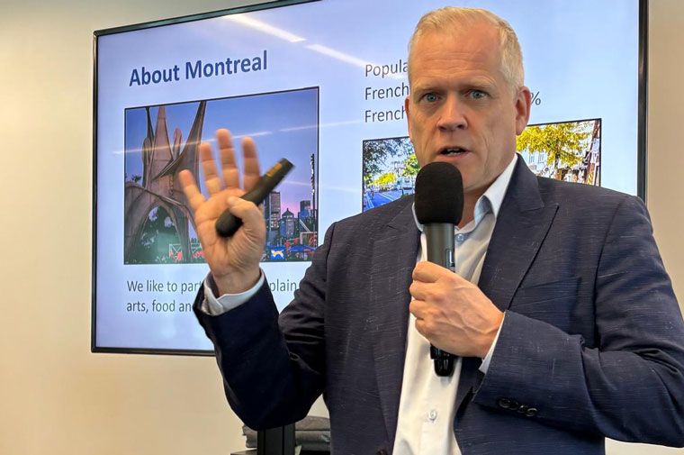 Le Devoir CEO Brian Myles talks to attendees on the recent INMA Media Subscriptions study tour.