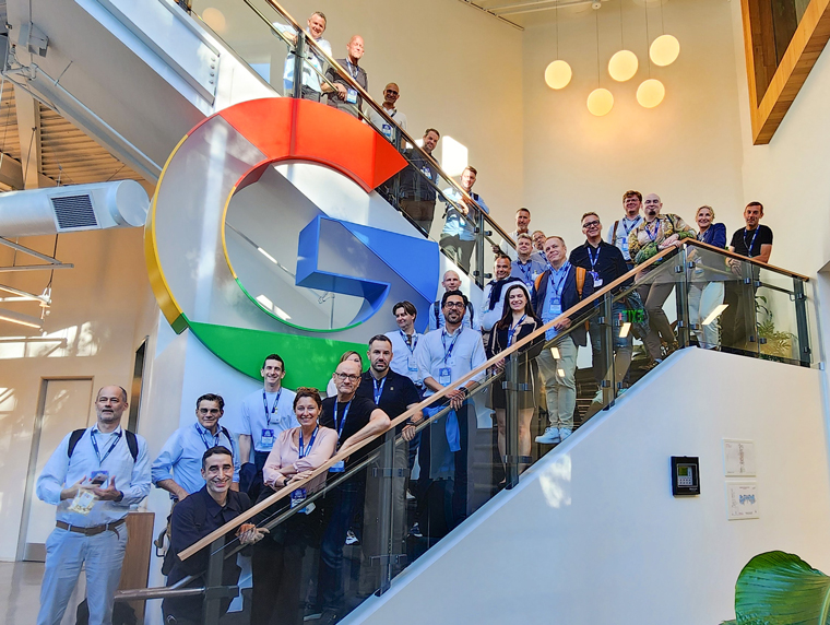 The study tour's 40 attendees on a stop at Google's campus.