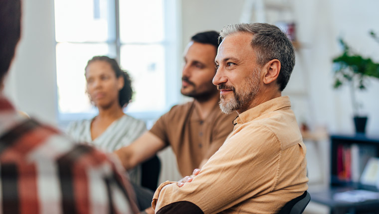 Standing shoulder-to-shoulder instead of face-to-face promotes easier conversation. 