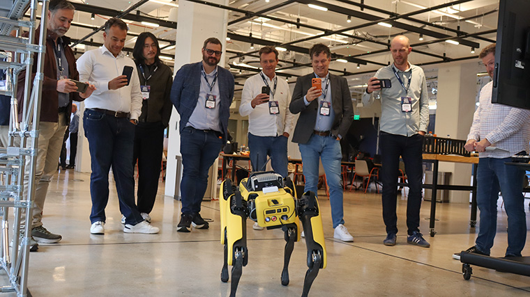 INMA study tour participants react to the four-legged robot called Spot from Boston Dynamics at the Hearst stop. INMA study tour participants react to the four-legged robot called Spot from Boston Dynamics at the Hearst stop.