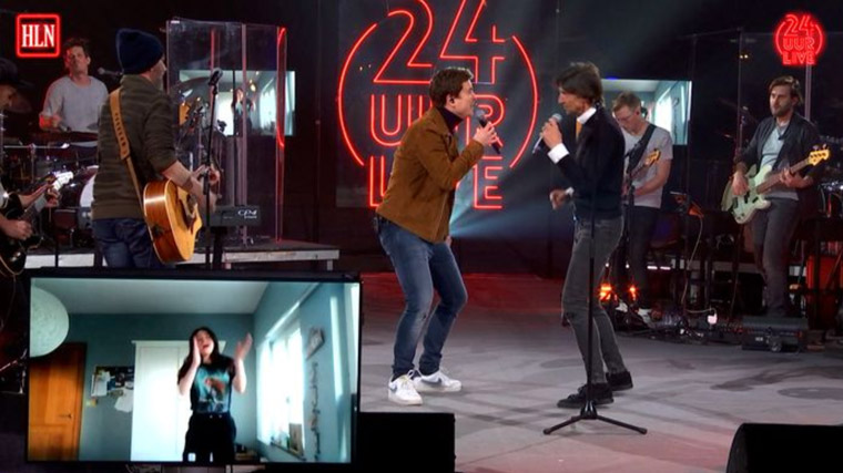 Attendees dancing at home were featured on big screens on stage.