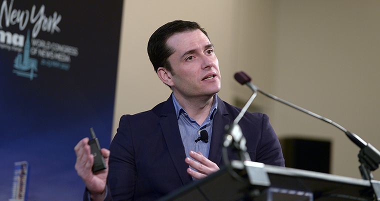 David Alandete, managing editor of El País in Spain, speaks at the INMA World Congress Brainsnacks session on Sunday.
