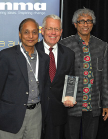 From left, Times of India CEO Ravi Dhariwal, INMA President Michael Phelps, and Times of India Executive President Bhaskar Das celebrate Bennett, Coleman & Company Ltd.'s achievements