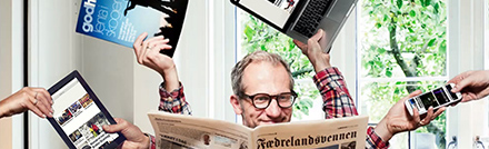 Picture of a man with several arms holding a news paper, tablet, magazine laptop and cell phone.