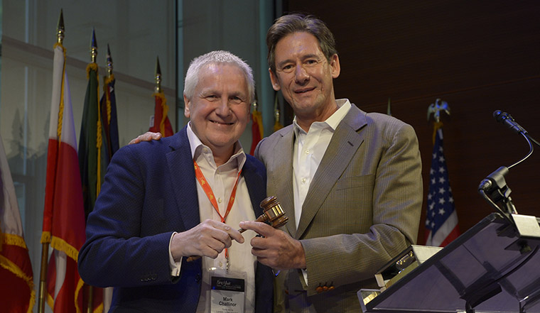 Outgoing INMA President Mark Challinor (left) with incoming President Eduardo Garces.